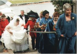 Andrea and her bridesmaids assend into the Gazeboo